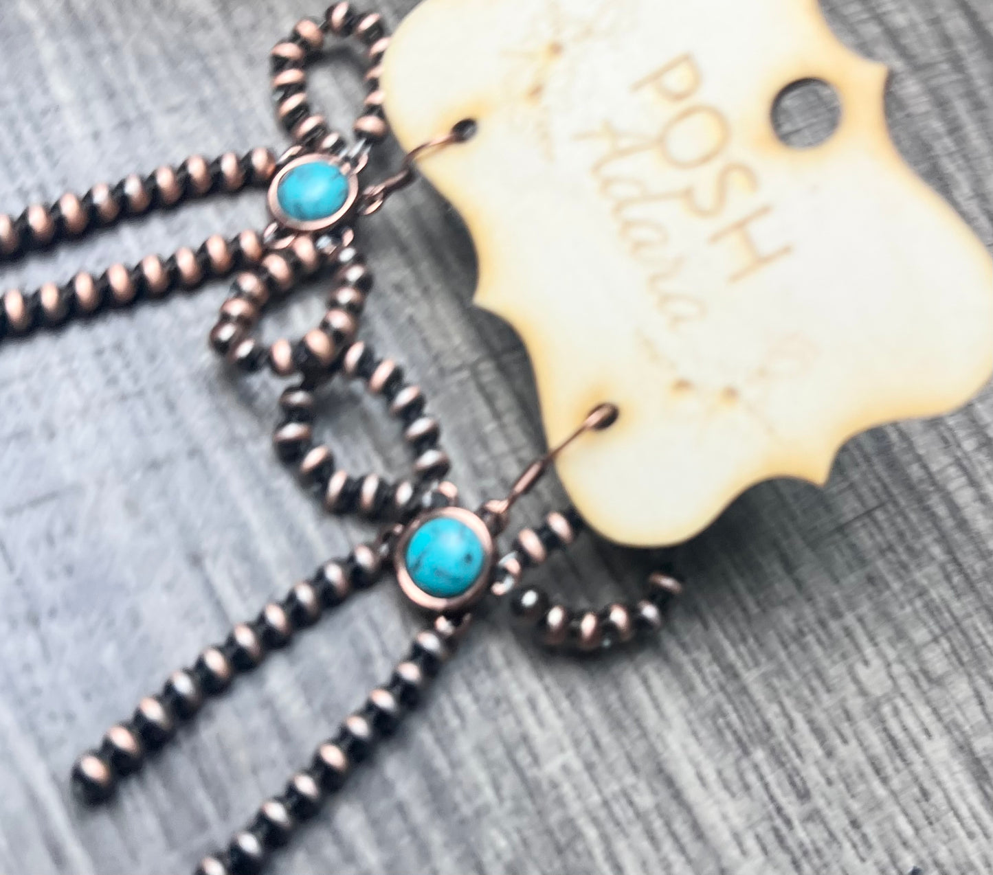 BOWS IN COPPER EARRINGS