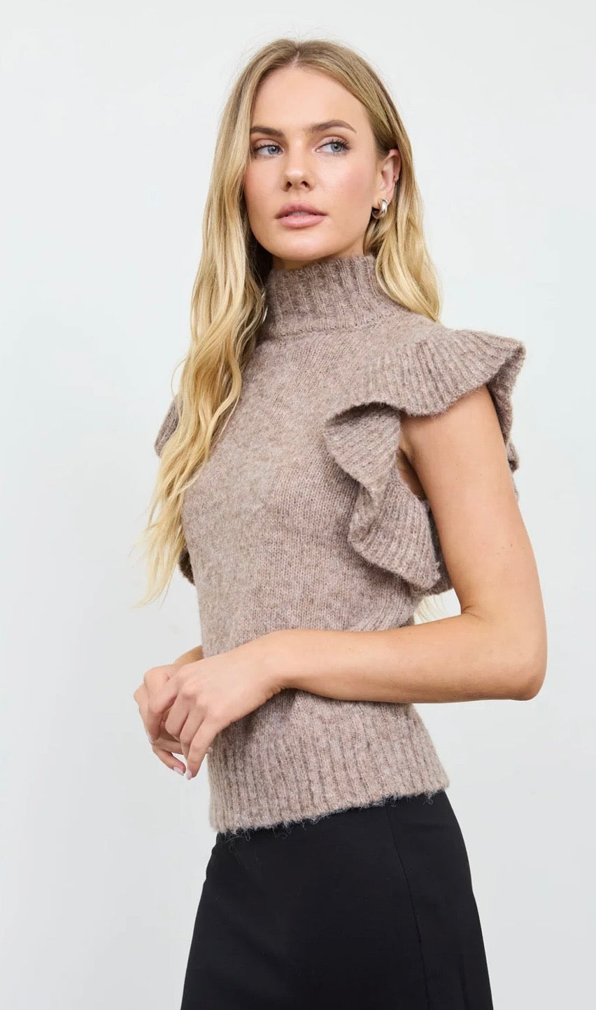 Side view of a taupe sweater with layered ruffle sleeves and ribbed trim