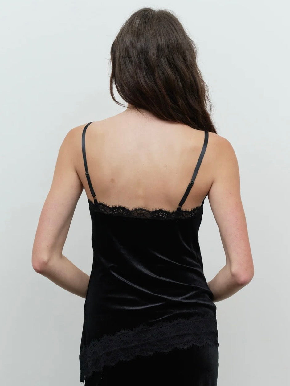 Back view of the black velvet camisole with thin straps and lace trim