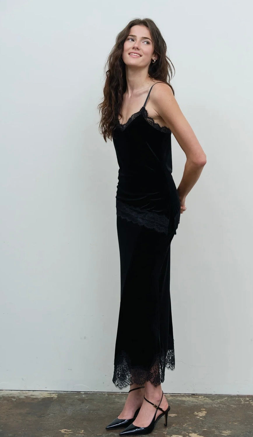 Black velvet camisole and long skirt set with lace trim and a lace hem