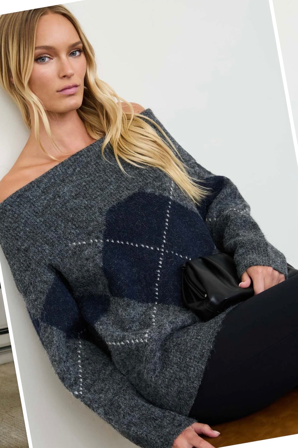 Charcoal gray off-the-shoulder sweater with navy argyle diamonds and long sleeves
