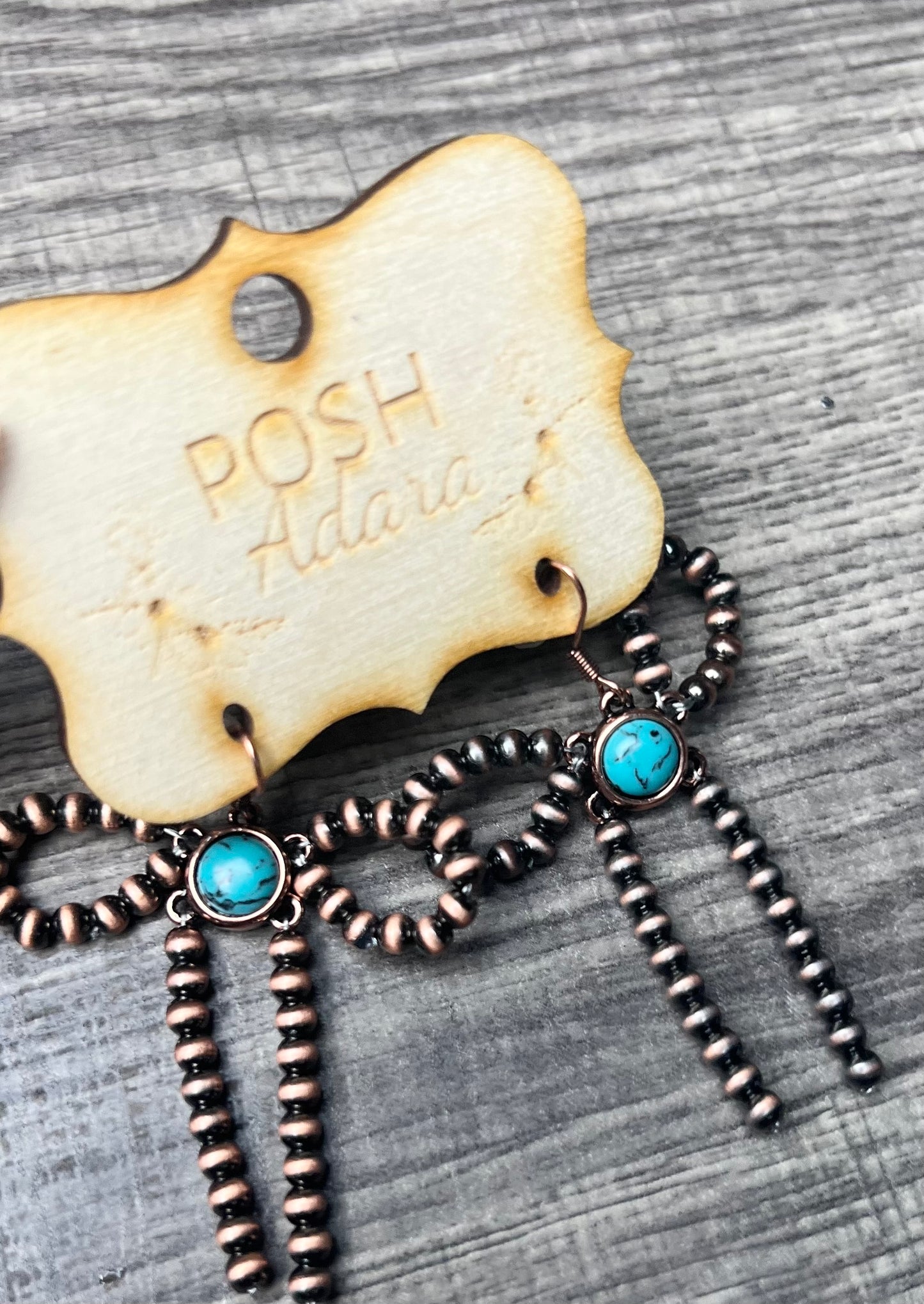 BOWS IN COPPER EARRINGS